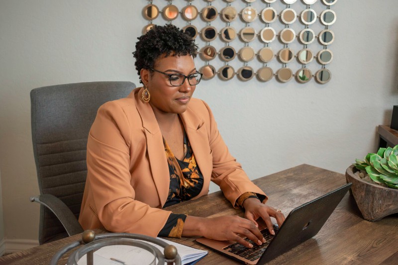 CJ working at her desk.