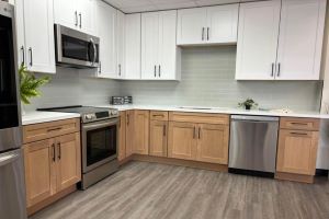 White bathroom cabinets and vanity.