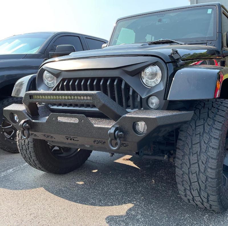 Jeep with front tow hitch.