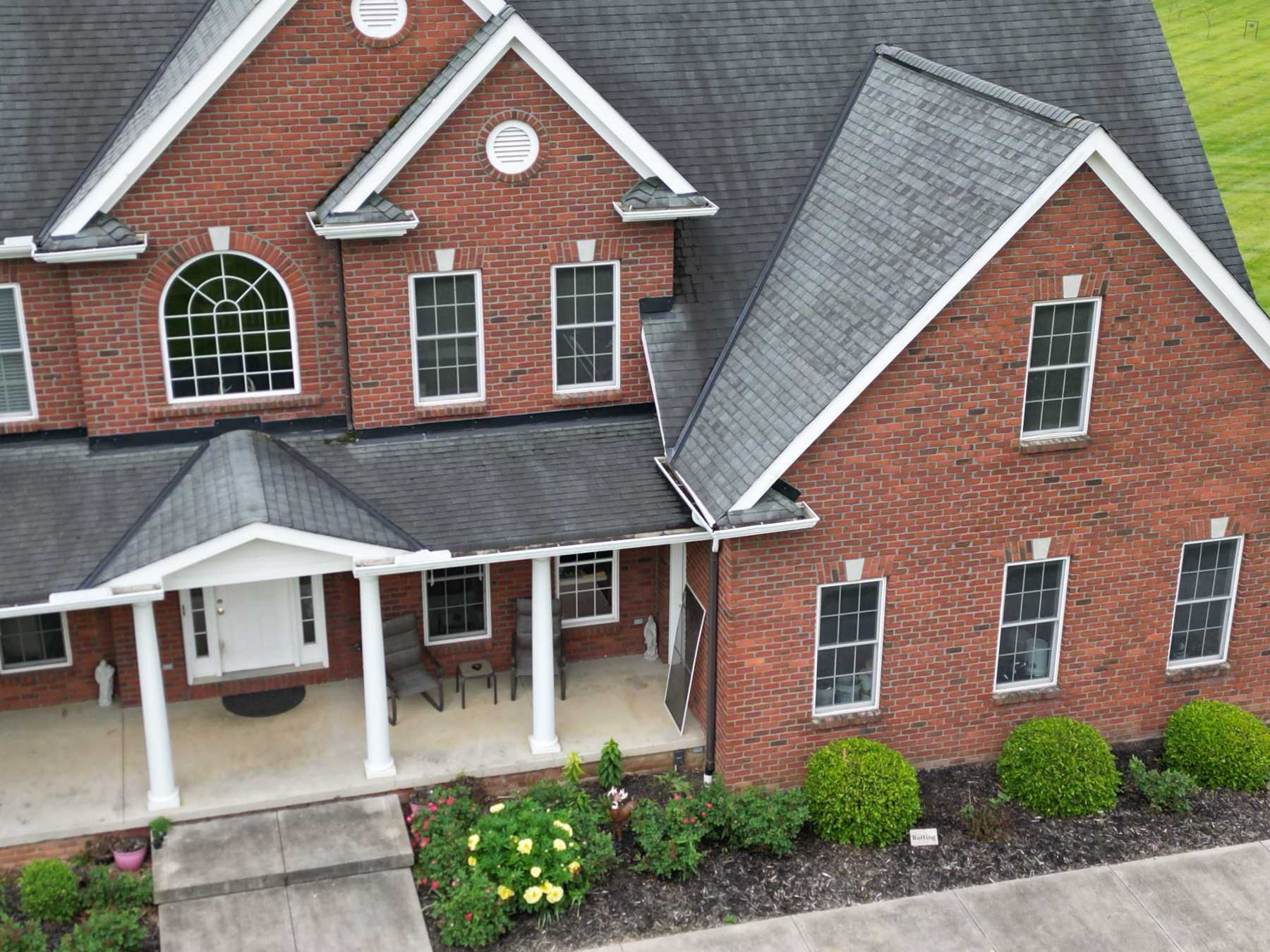 Stunning red-brick home with a new roof.