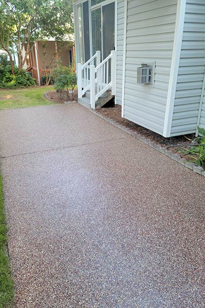 An outdoor sidewalk with an epoxy coating.