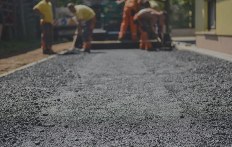 An asphalt patio under repair