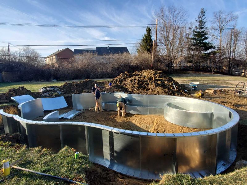 The shell of a swimming pool prior to being backfilled