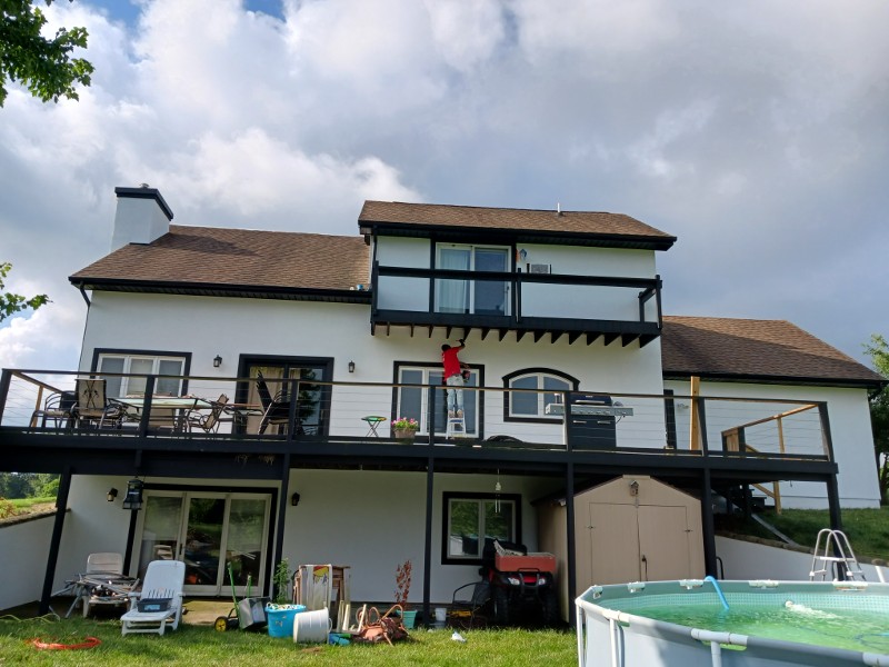 A home’s rear exterior freshly painted.