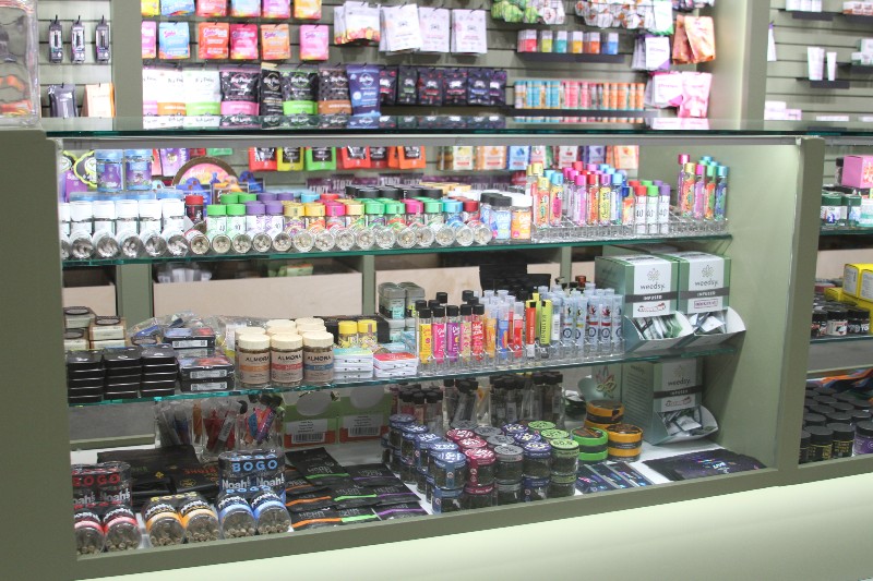 Coastal Cannabis dispensary shelves with marijuana products