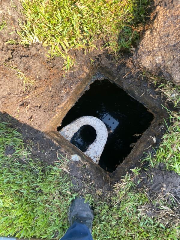 A septic system with the cover removed.