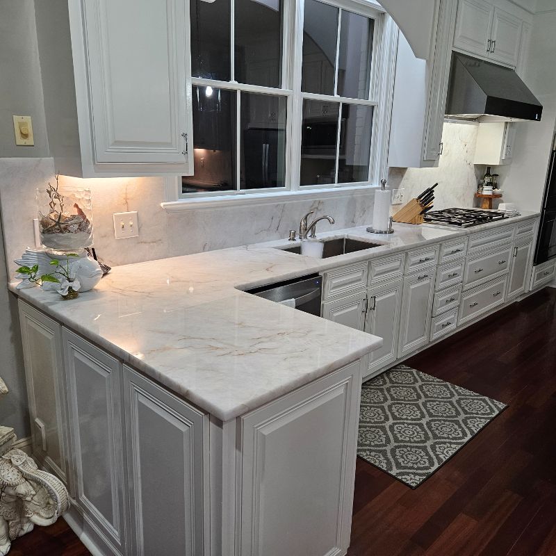 A kitchen with quartz countertops.