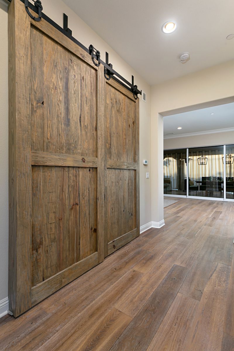 Bar style doors added to hallway