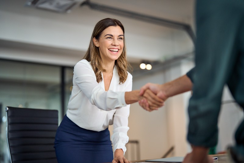 two people shaking hands