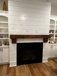 Custom built-out fireplace and mantel.