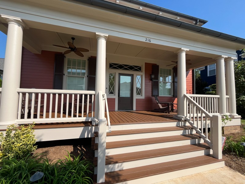 A corral-colored residential property.