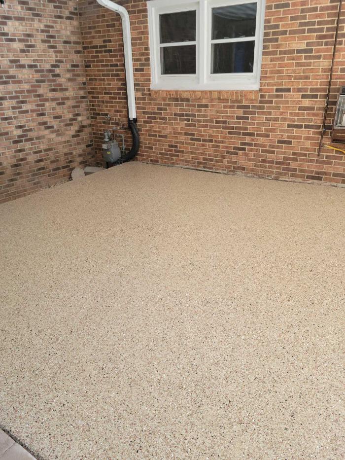 An outdoor patio with epoxy flooring.