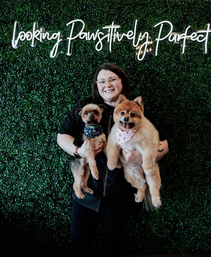 Madison posing with two dogs