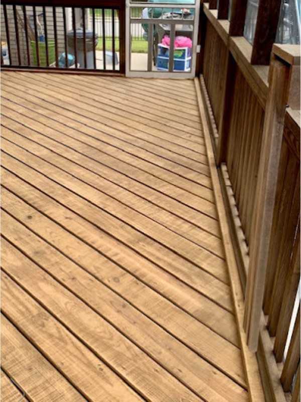 Wood deck with railing.