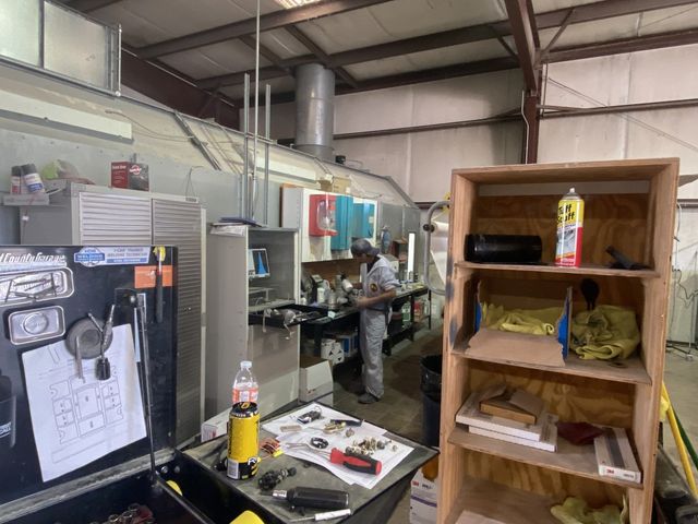 A diagnostics equipment display in an auto repair shop.