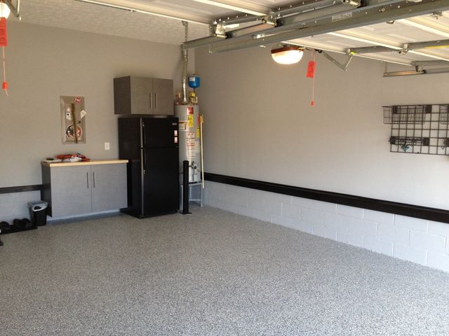 White and gray-speckled floor coating from TGG Garage.