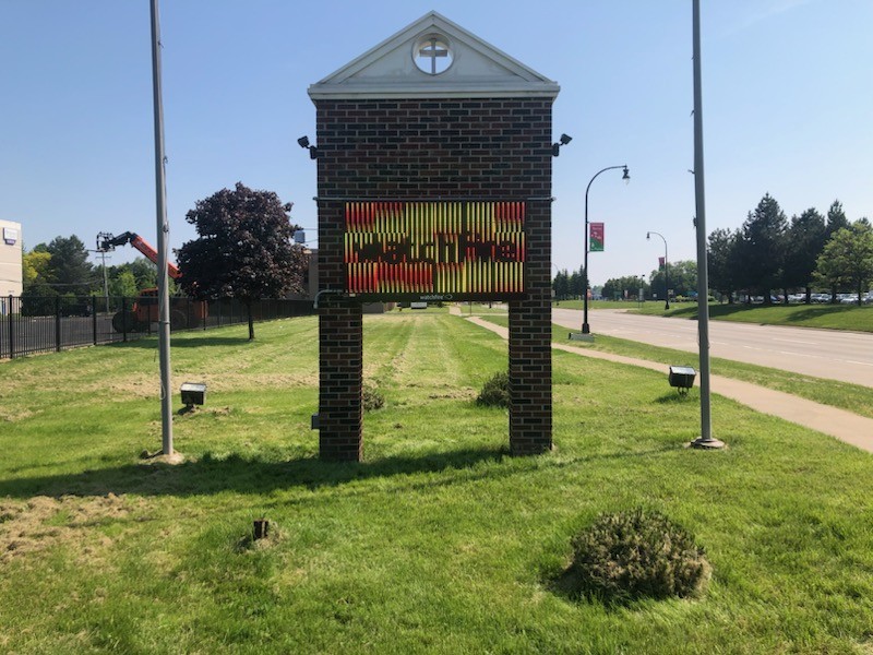 Community Markets & Pharmacy sign