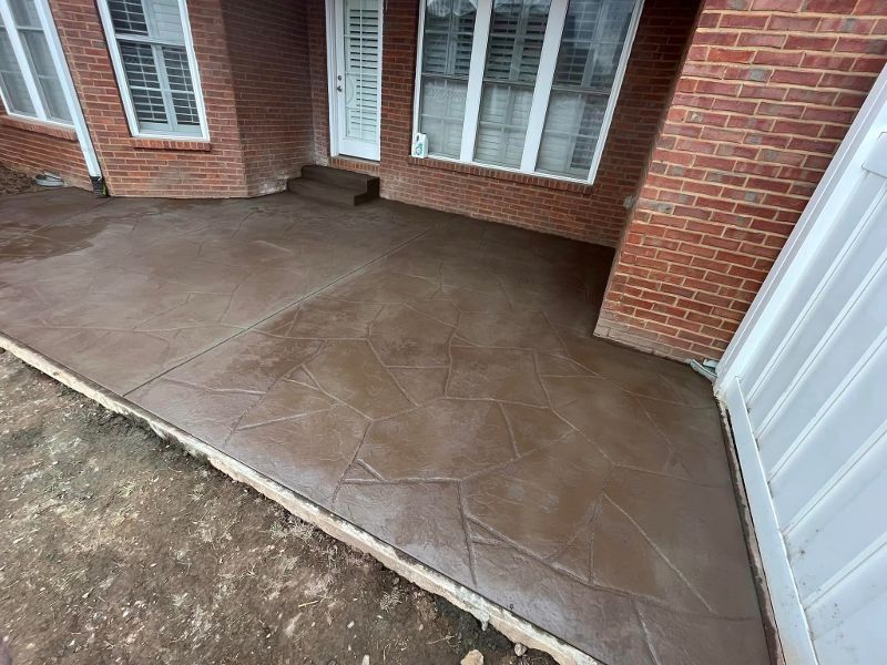 A freshly poured stamped concrete entry to a home.