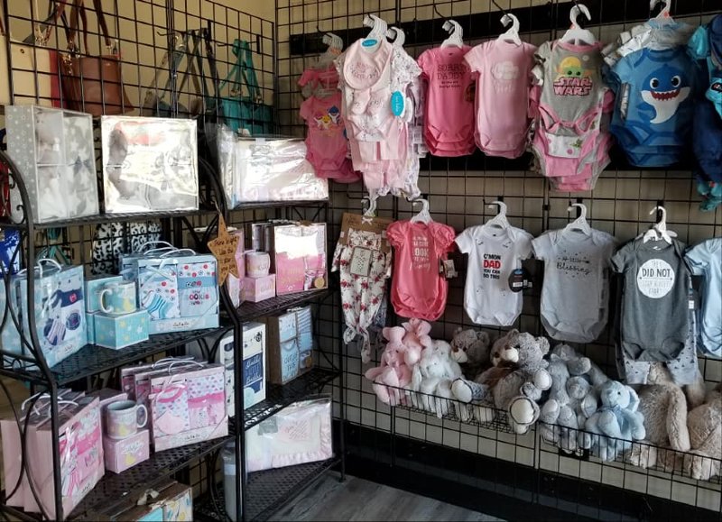 baby clothes, gift shop, jewelry, handbags, candles, books, fashion, kitchen supplies