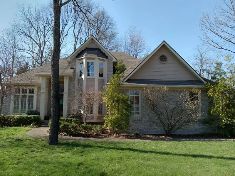 A home’s exterior with a fresh paint touchup.