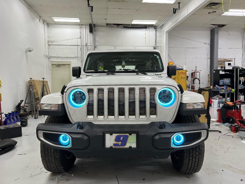 Jeep with colored headlights.