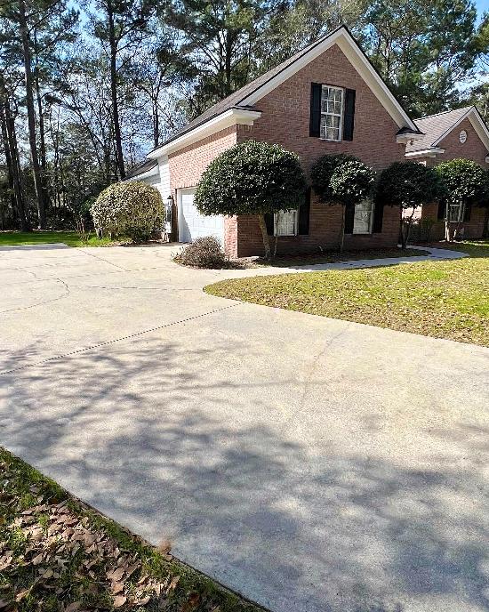 The same driveway after being pressure washed.