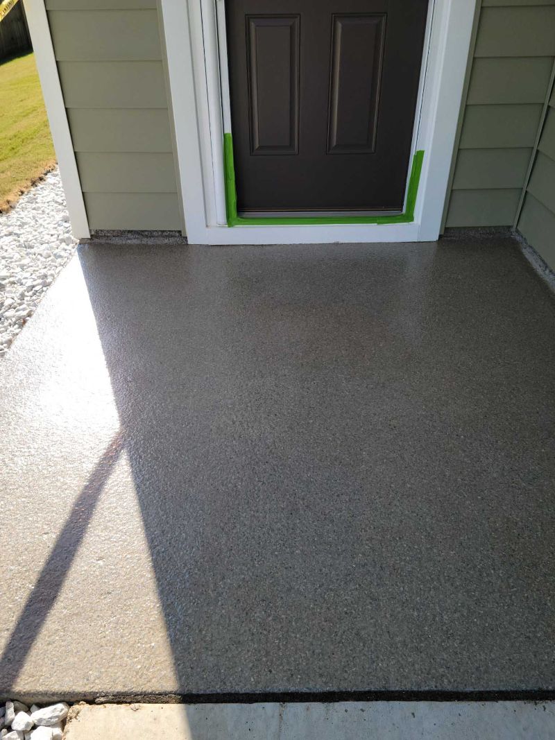 A home’s front patio with epoxy flooring.