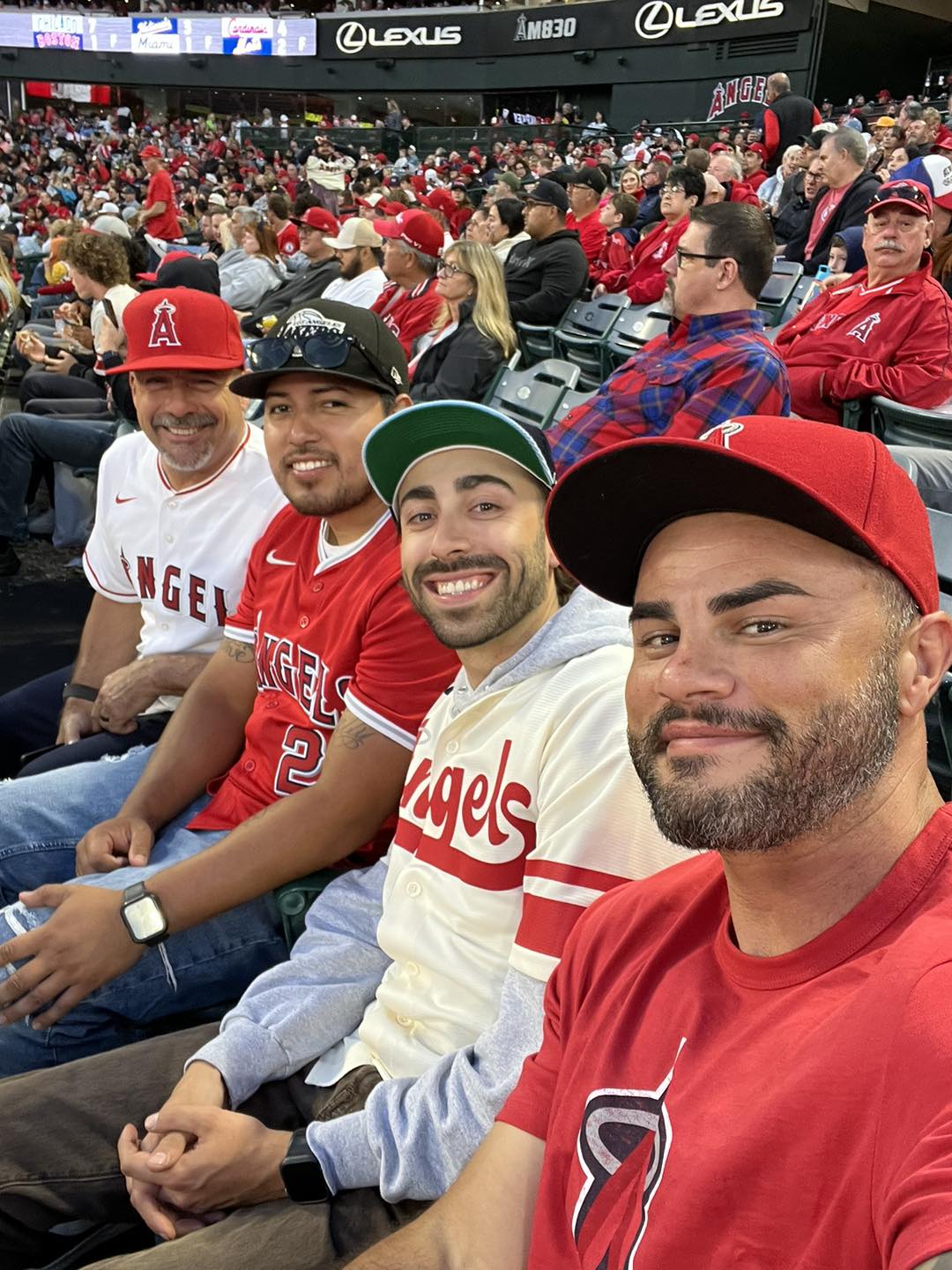 Contractors enjoying a baseball game.