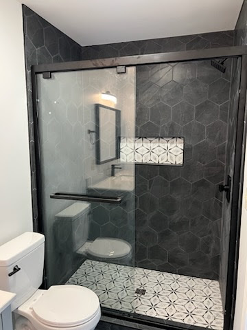 shower with decorative tile