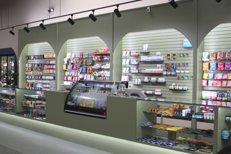 Coastal Cannabis dispensary shelves with marijuana products