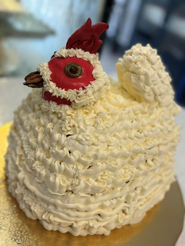 decorated cake shaped like a chicken