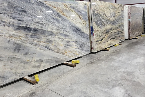 A display of large granite slabs.