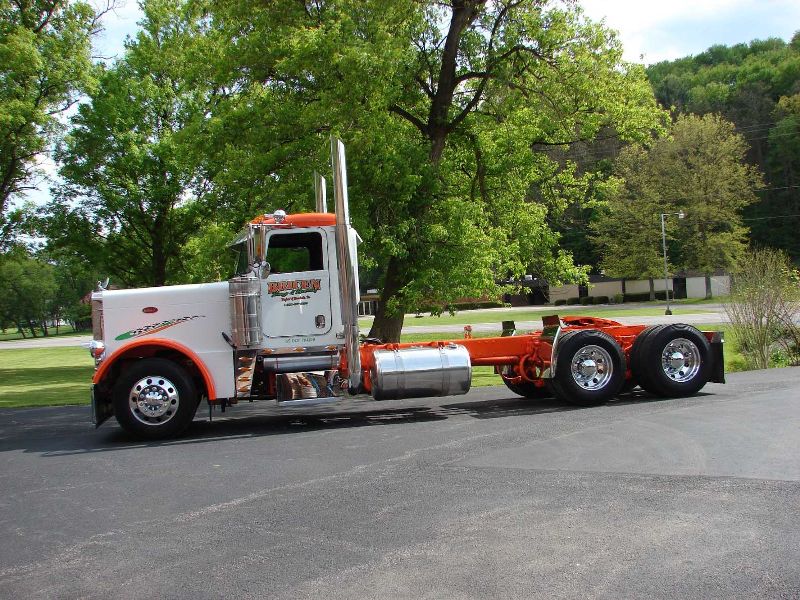 left side of a white long haul truck