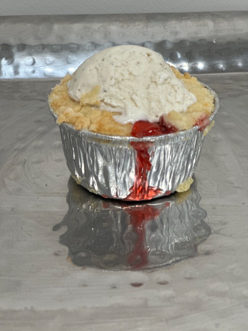 Fruit cobbler with ice cream