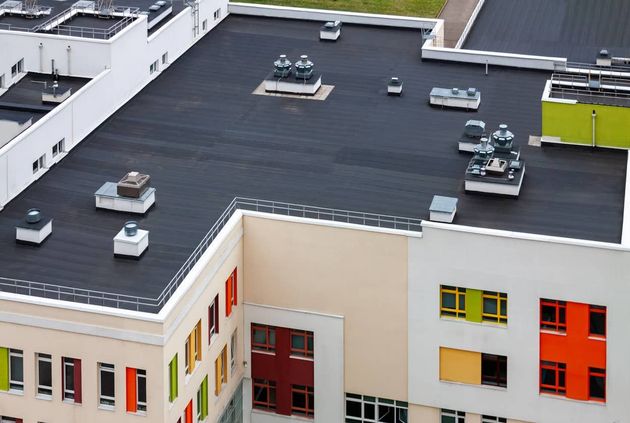 Aerial view of a flat commercial roofing system