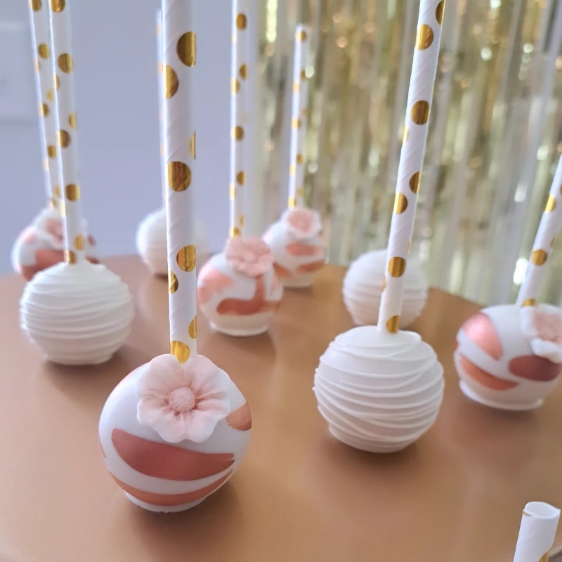 Assorted iced cake pops.