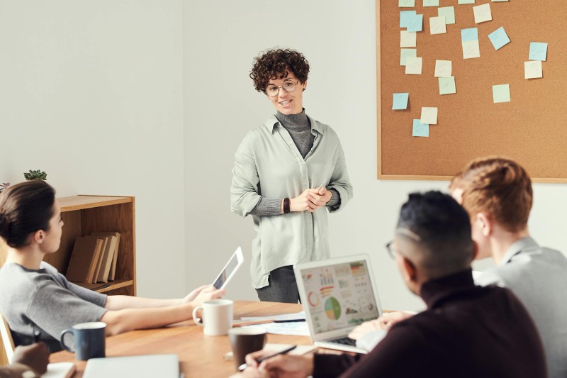 woman giving a presentation in a meeting