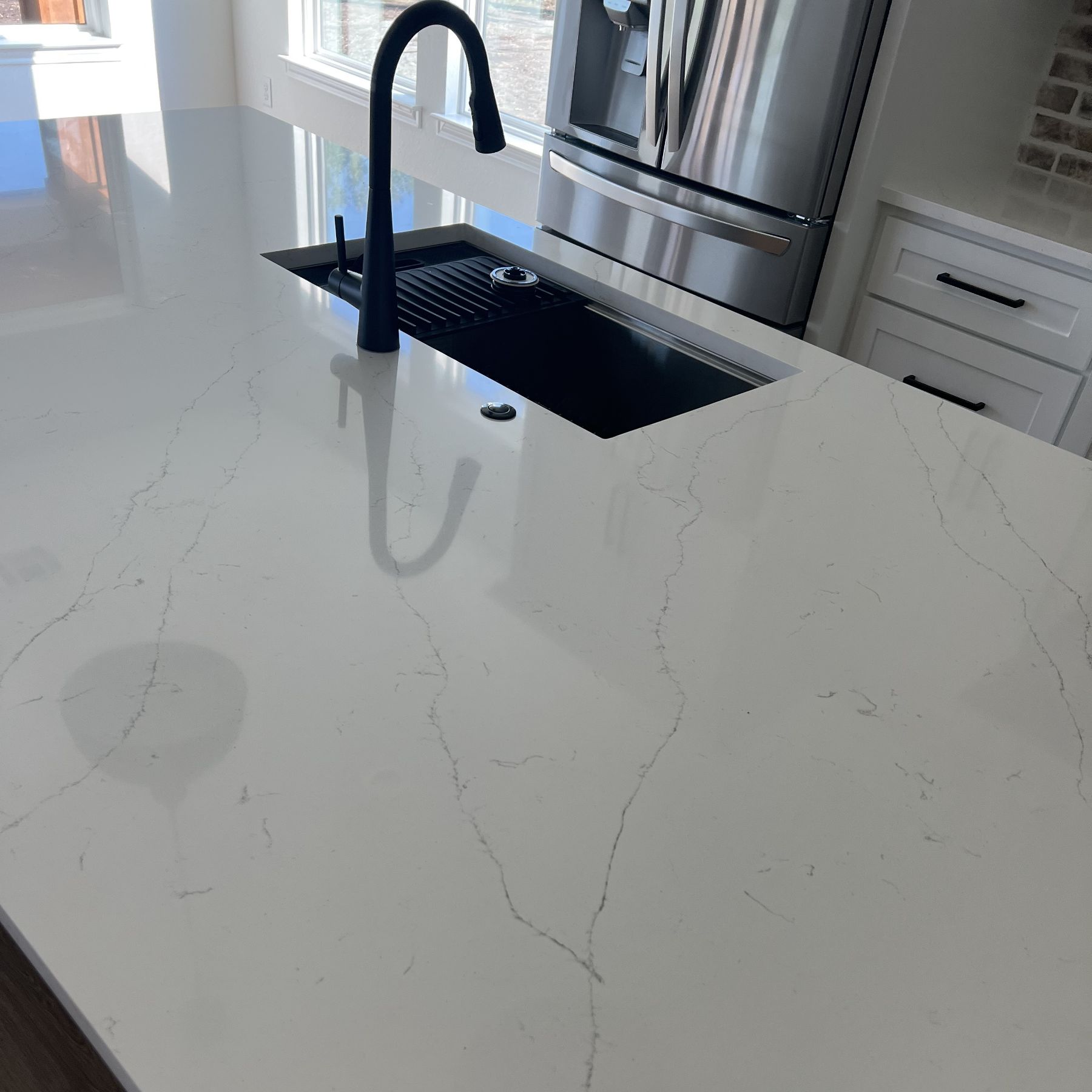 White marble kitchen countertops.