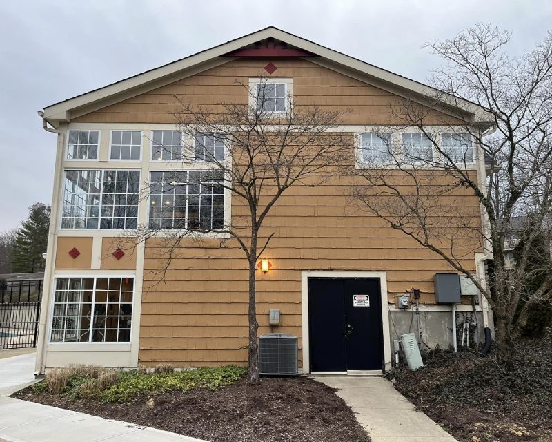 Two story home with vinyl siding