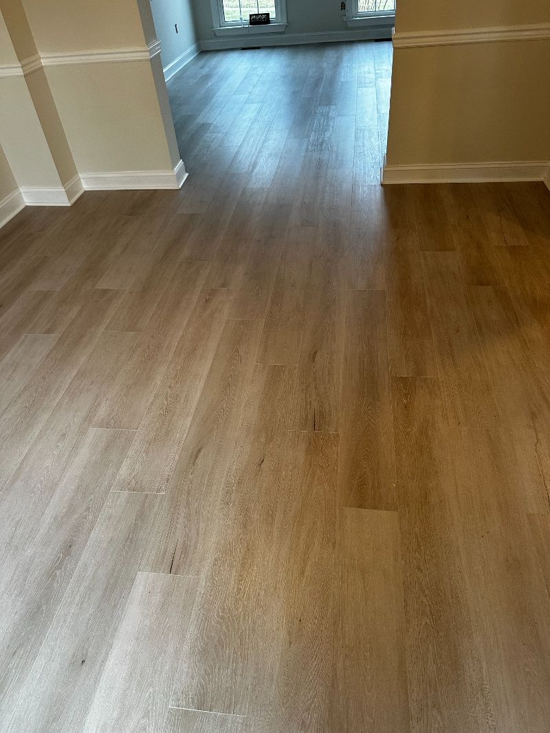 Beige hardwood flooring.