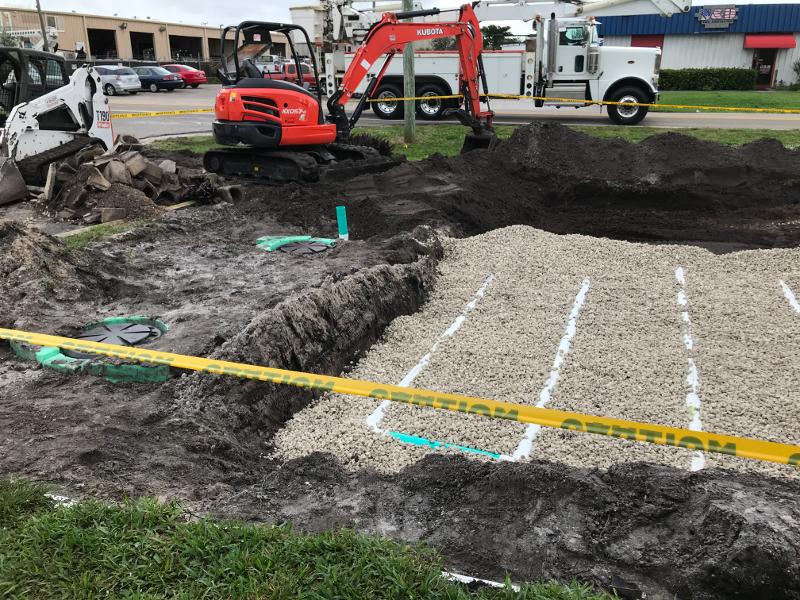 Excavation work being completed for a septic system.