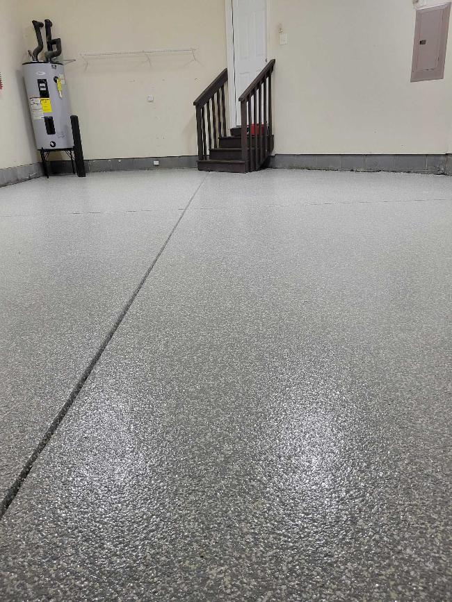 A garage floor with epoxy flooring.