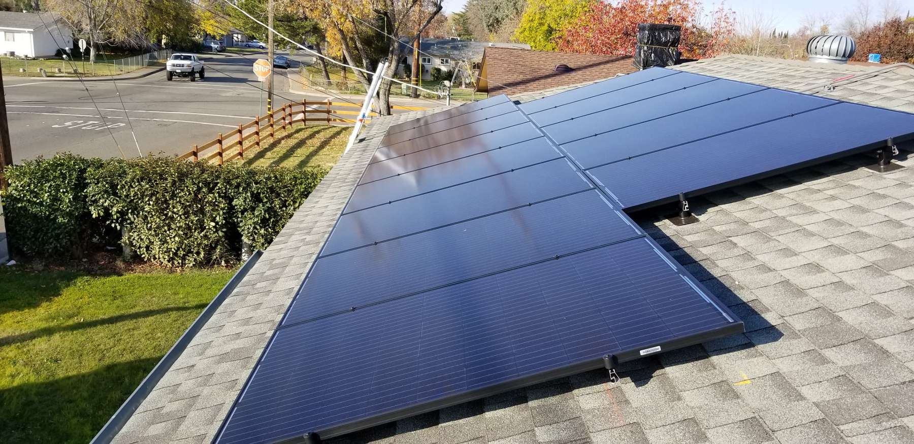 Residential solar panels mounted to a roof.