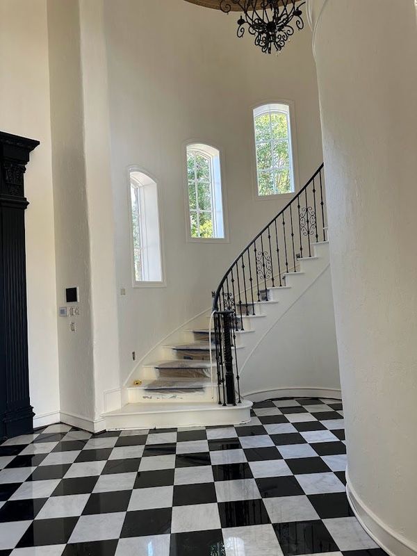 black stairwell with white walls