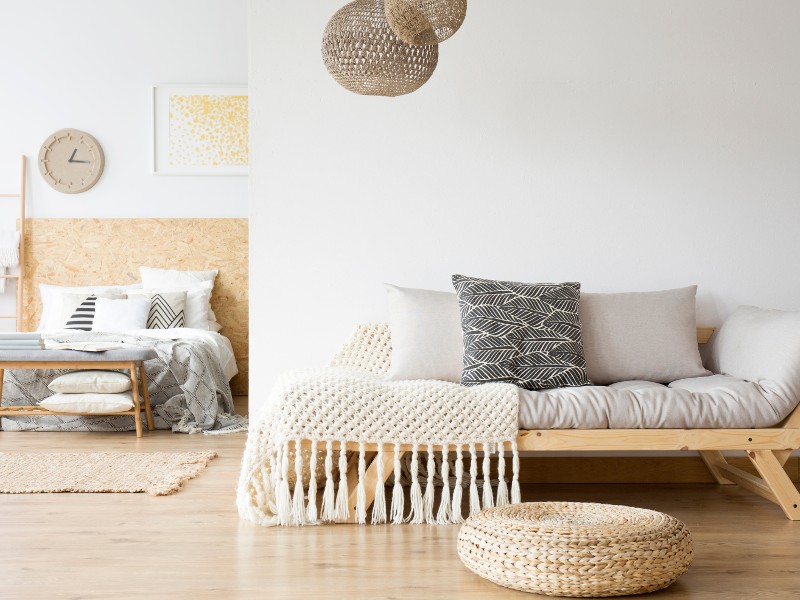 A sitting area with lounge couches and pillows.