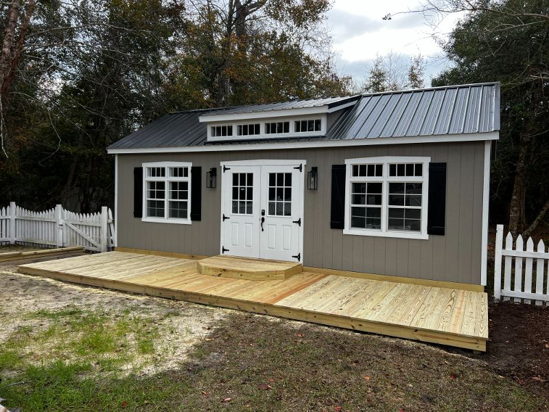 Newly built front porch for a high-end backyard shed.