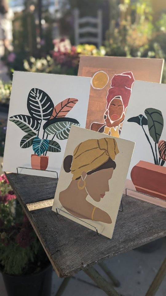 Four painted prints of people and plants.