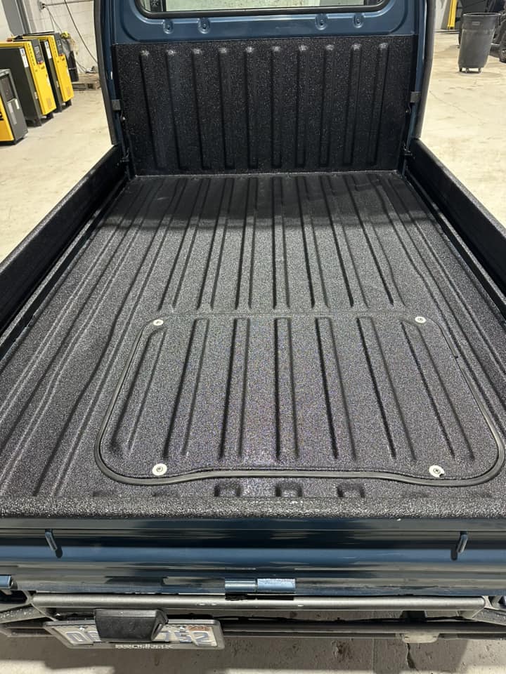 Seamless spray-on bedliner.