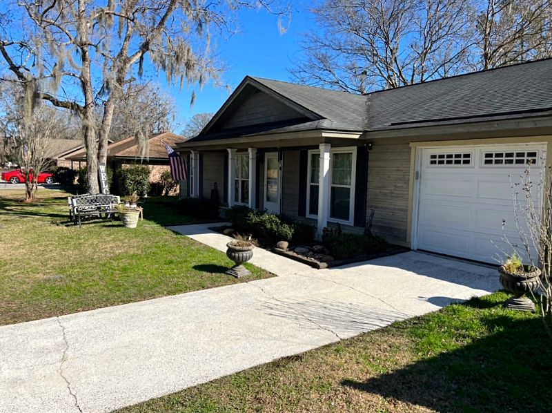 The same driveway after being pressure washed.