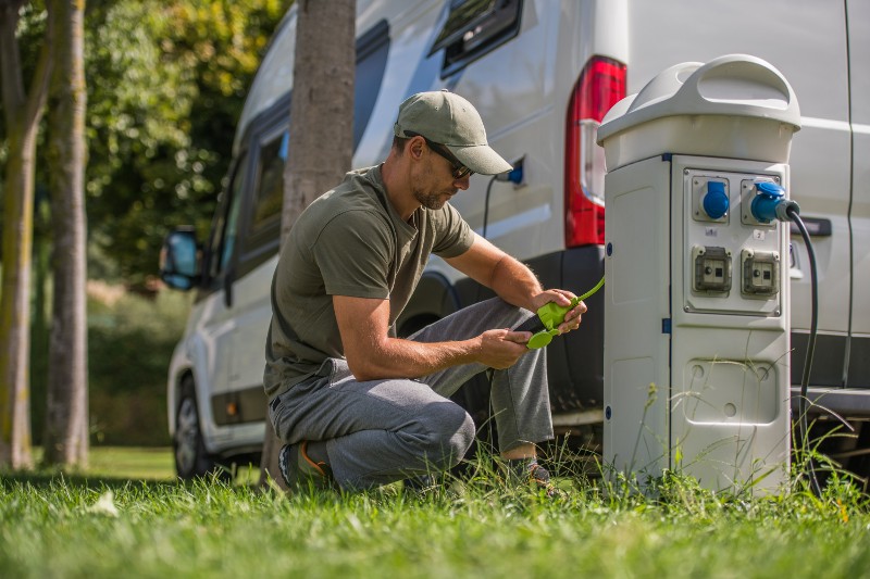 Man using his RV electric hookup.